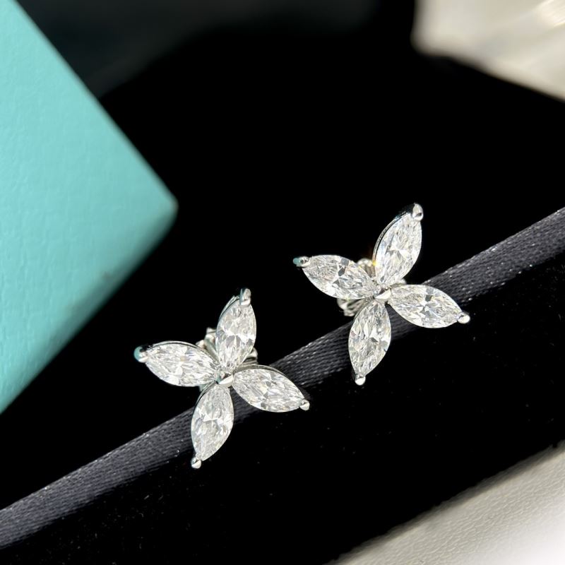 T*f*ny earrings